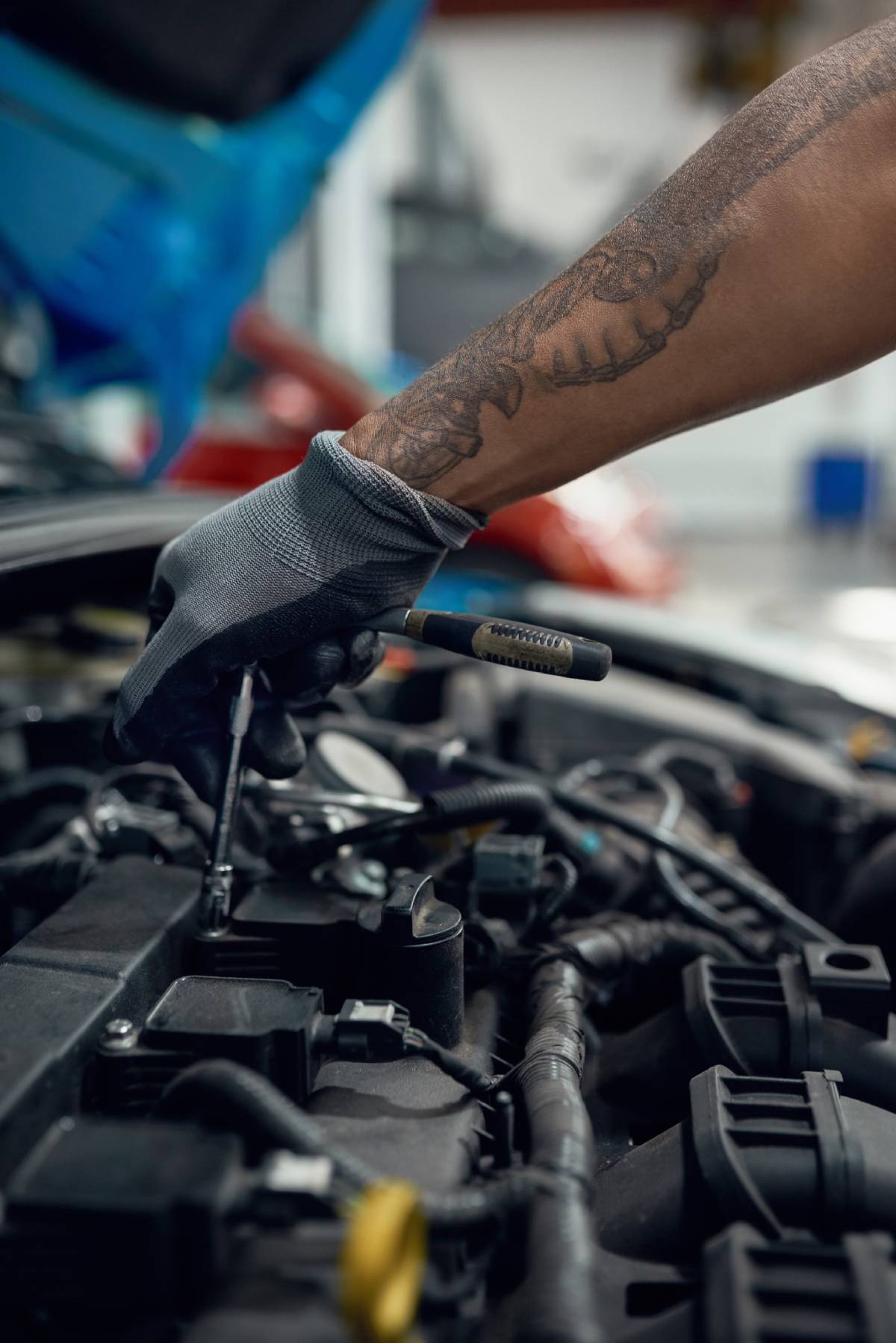 BSC Contact Page Image 1 Man with screwdriver working with engine